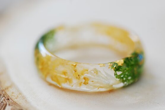 close up of yellow citrine gold and green moss ring