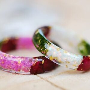 white opal and pink opal rings made with moss and rose flower