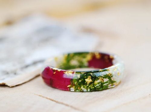 Ring made with green moss rose petals and white opal