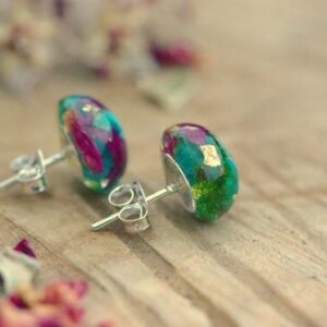 Resin earrings made with turquoise, moss and pink flowers