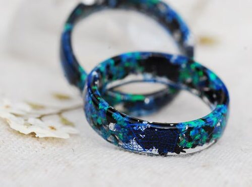 fantastic opal in greenish blue colors in resing ring