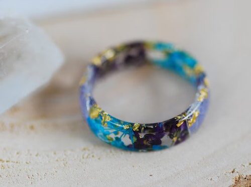 Flower resin ring with blue and purple petals with gold flakes