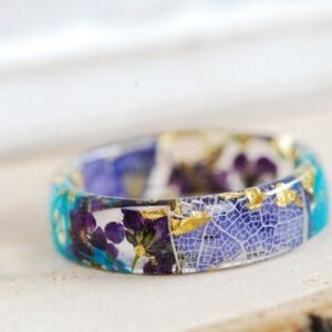 Flower resin ring with blue and purple petals with gold flakes
