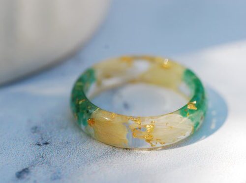 ring made with emerald jasmine and cornflowers