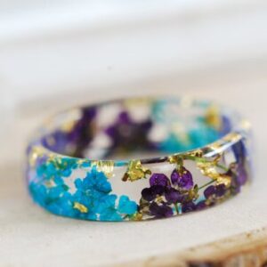 Flower resin ring with blue and purple petals with gold flakes