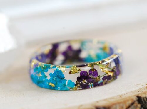 Flower resin ring with blue and purple petals with gold flakes