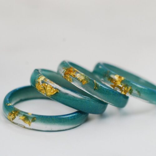 Thin Blue resin ring with gold flakes