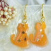 drop earrings with orange cats