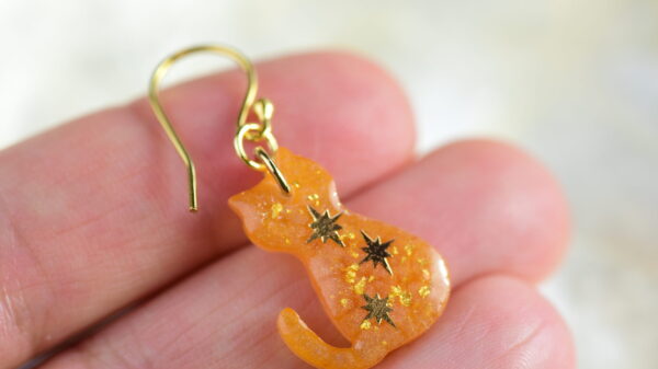 Orange cat drop earrings with stars and gold flakes