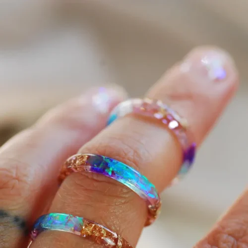 rainbow ring on finger