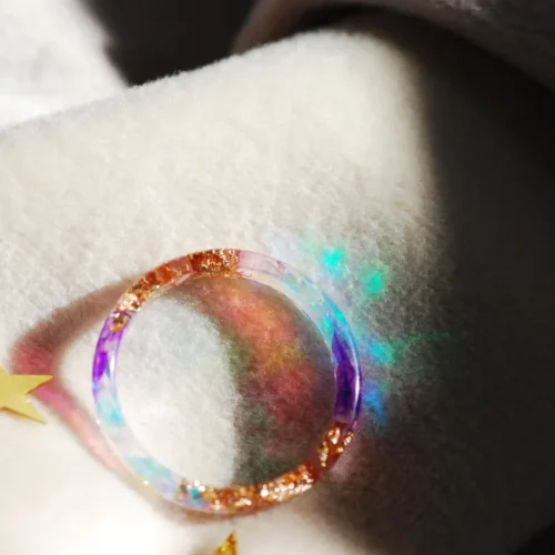 light reflex through rainbow ring