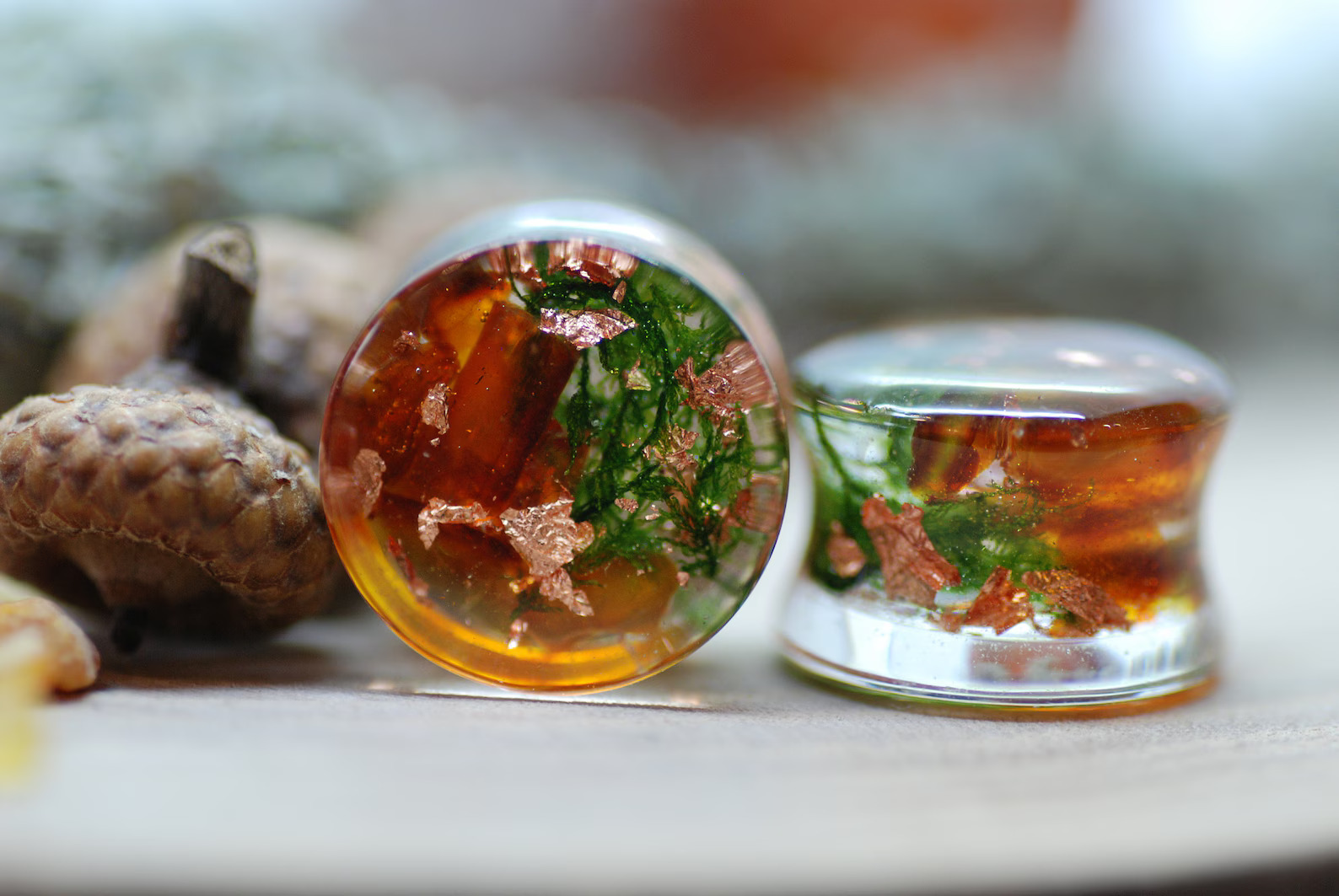 real amber gauges with moss