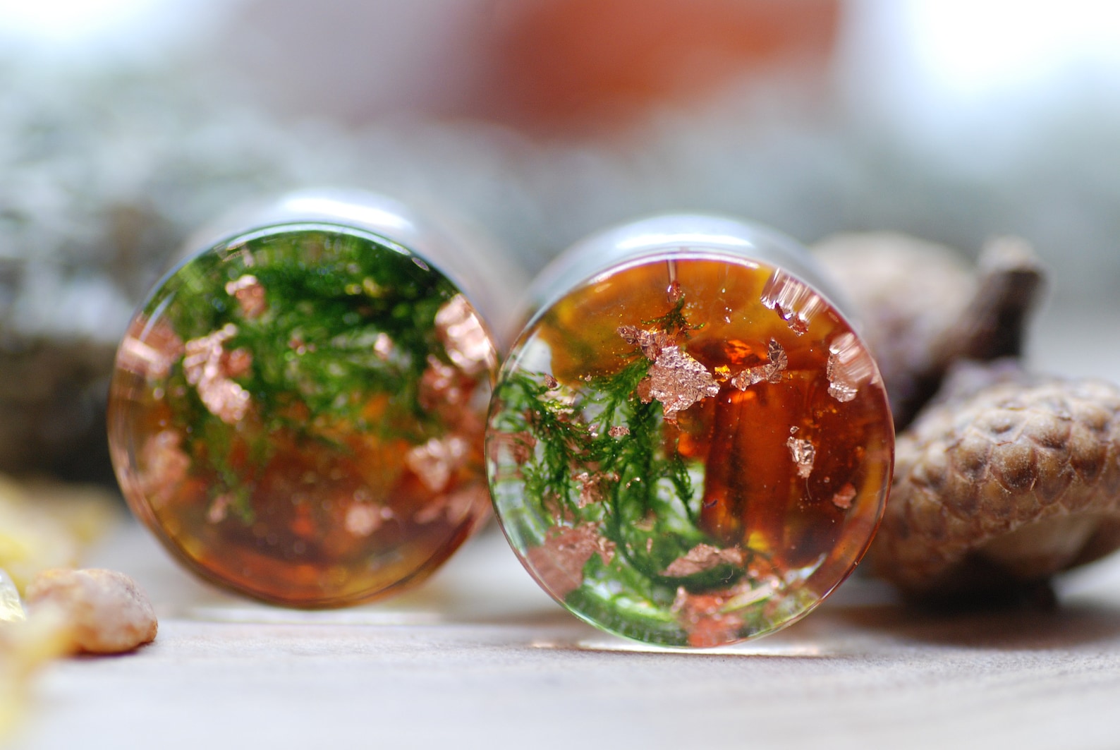 orange green ear plugs with amber and moss