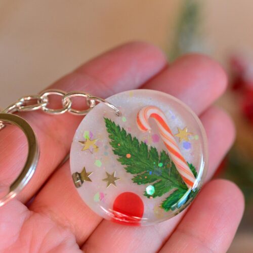 hand holding christmas bag charm