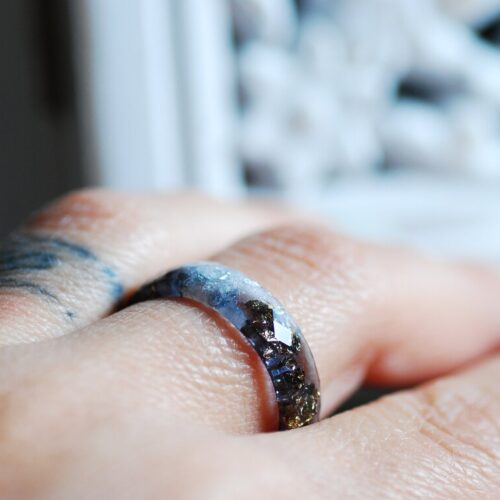 black silver ring on finger
