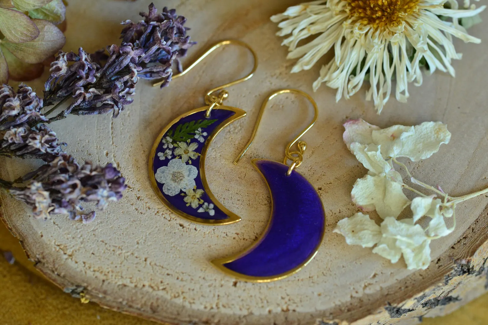 moon shaped gold earrings with flowers