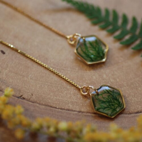 very original earrings with green moss