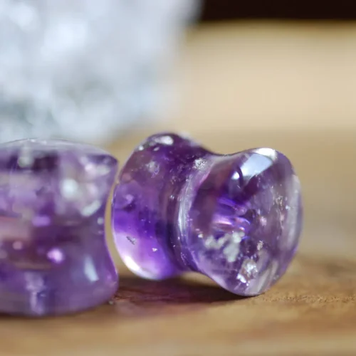 purple ear plugs with natural amethyst crystals