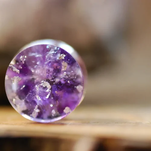 purple gauges with amethyst stones and silver