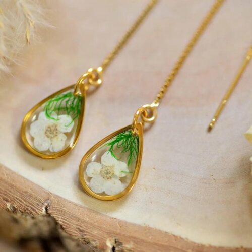Pair of threader earrings with flowers