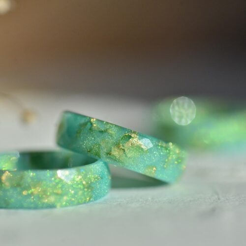 Green resin ring handmade by Alpaca Blue with gold flakes